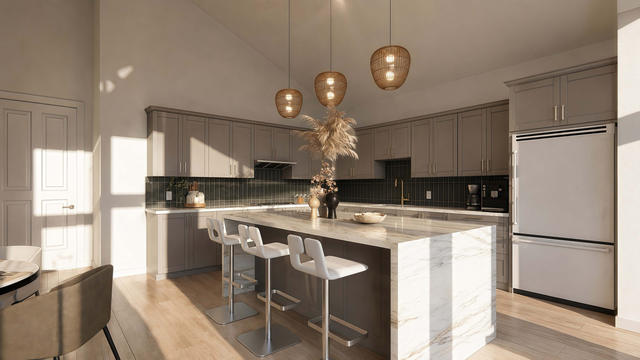 Kitchen view of the 1,235-square-foot upper one-bedroom casita over a multi-garage composition, showing large island kitchen.