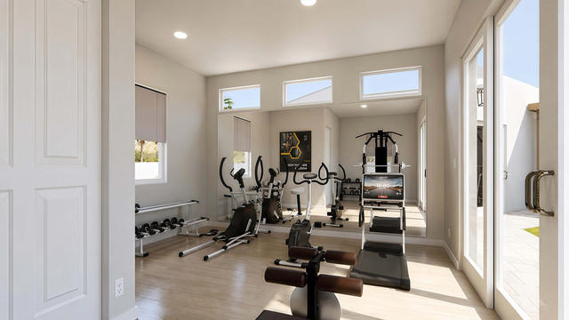 Gym And Office view of the 300-square-foot, 20-by-15-foot gym and office casita, showing daylit exercise room.