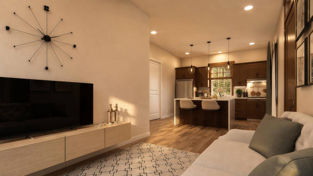 Living Room view of the 600-square-foot, 20-by-30-foot one-bedroom casita with covered porch, showing the main seating area and windows.