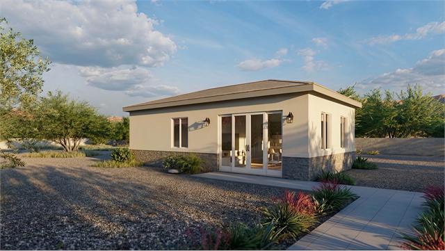 Entry exterior rendering of the 20 by 35 casita with glass doors and desert landscape