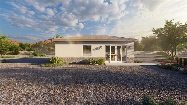 Front exterior rendering of the 20 by 35 700 square foot casita with desert landscaping