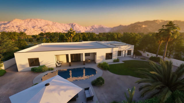 Aerial Rear view of the 360-square-foot, 21-by-12-foot attached casita, showing the long attached building form and rear outdoor area.