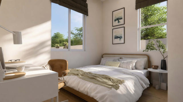 Bedroom view of the 400-square-foot, 25-by-16-foot one-bedroom casita with porch, showing compact corner bedroom.
