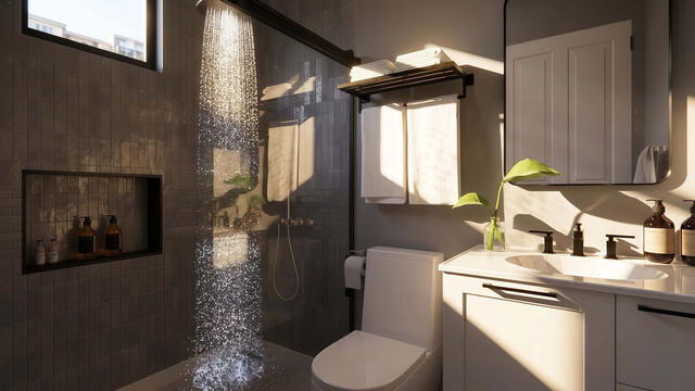 Interior rendering of the full bathroom showing a tiled shower, vanity, toilet, and high window