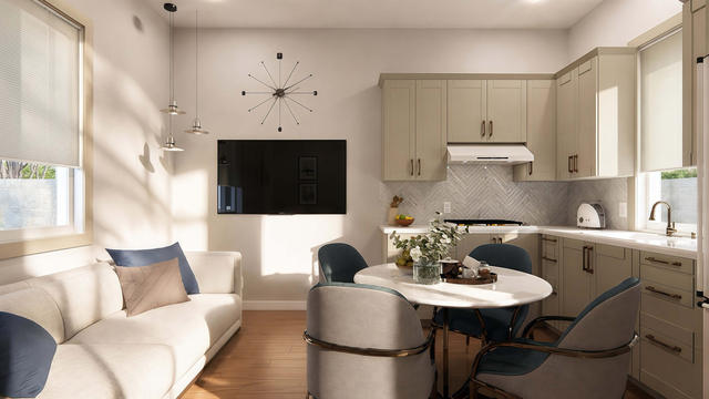 Open casita living and kitchen room with compact dining table