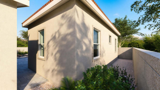 Side three-quarter rendering of a compact one-bedroom casita addition