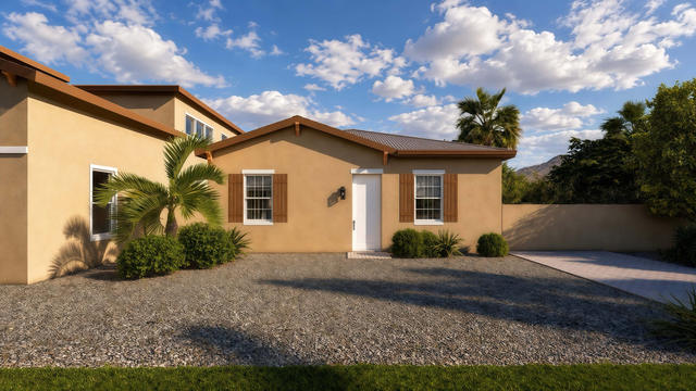 Front exterior rendering of the 30 by 30 studio casita showing gable roof forms, windows, entry door, and desert landscaping