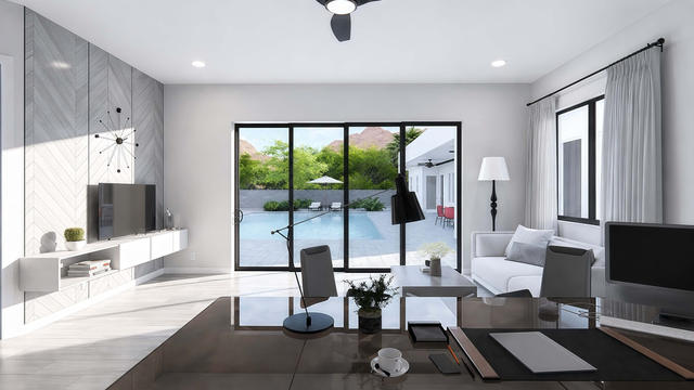 Interior rendering of the open living area showing seating, a media wall, desk, kitchen, and glazed patio doors