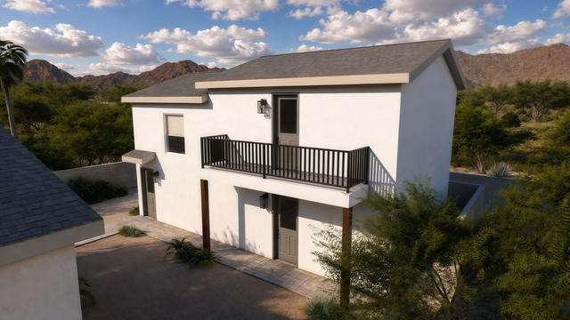 Balcony Side view of the 690-square-foot casita over a detached garage, showing the upper balcony and detached building form.