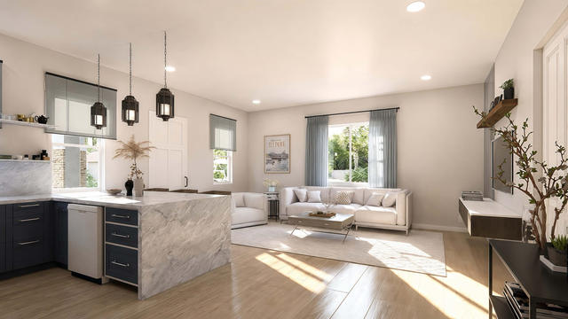 Open Living view of the 1,200-square-foot three-bedroom casita with a 34-by-37-foot-6-inch overall extent, showing kitchen island and lounge.