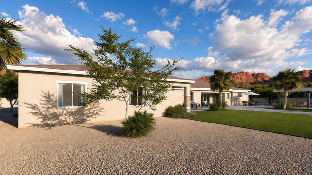 Rear Side view of the 1,200-square-foot three-bedroom casita with a 34-by-37-foot-6-inch overall extent, showing long rear stucco elevation.