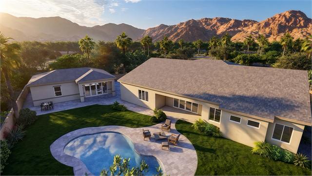 Wide aerial backyard rendering of the 36 by 27 casita and main home
