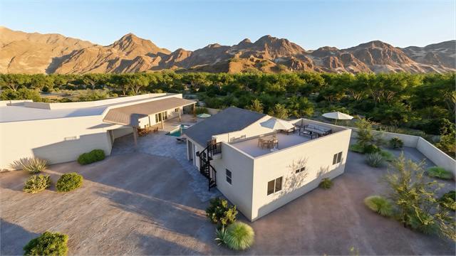 Driveway aerial rendering of the 37 by 35 ADU casita with desert mountains