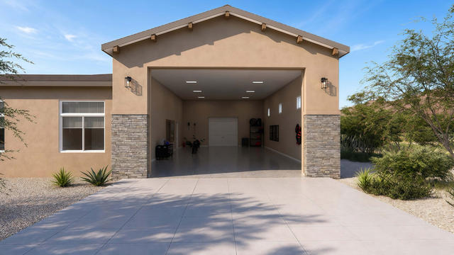 Garage Front view of the 689-square-foot casita with 1,355-square-foot attached garage, showing the garage doors and connected casita massing.