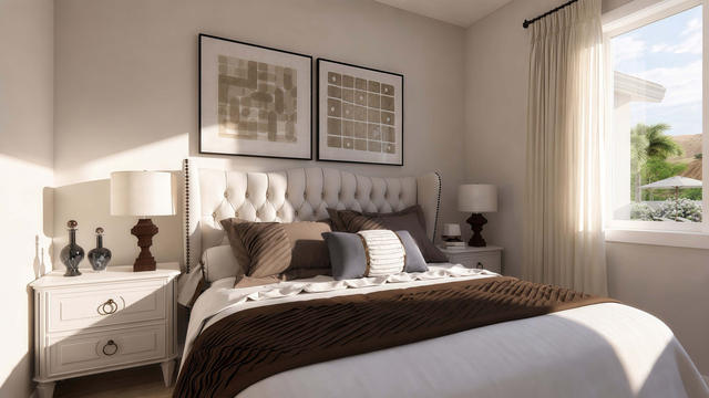 Bedroom view of the 1,104-square-foot, 70-by-34-foot two-bedroom casita with garage, showing neutral guest bedroom.