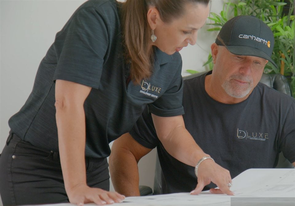 Arizona Casita Builders team reviewing a custom casita design plan