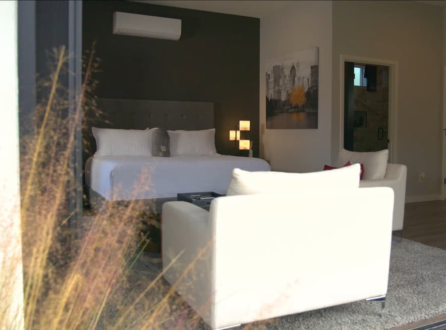 Interior view of the Buckeye studio casita living and sleeping area opening toward the patio