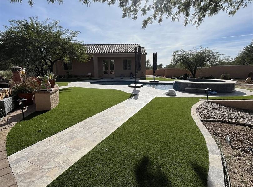 Backyard walkway and pool view toward the Cave Creek casita ADU