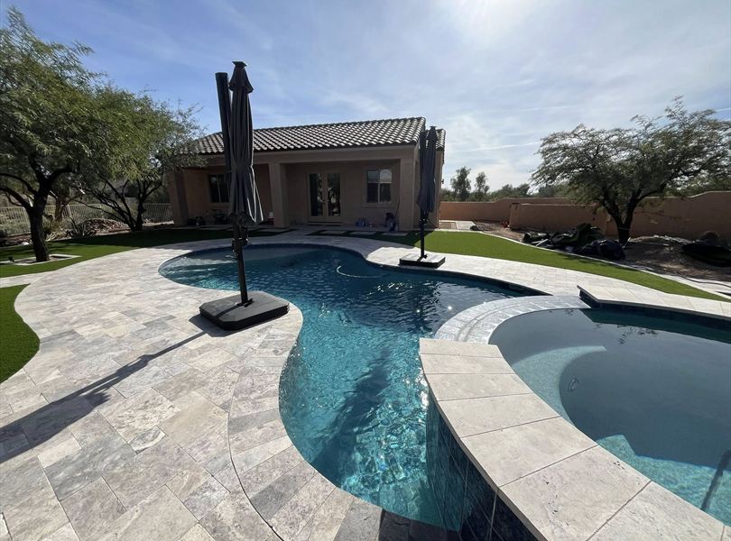 Exterior pool view of the Cave Creek casita ADU with covered patio and concrete tile roof