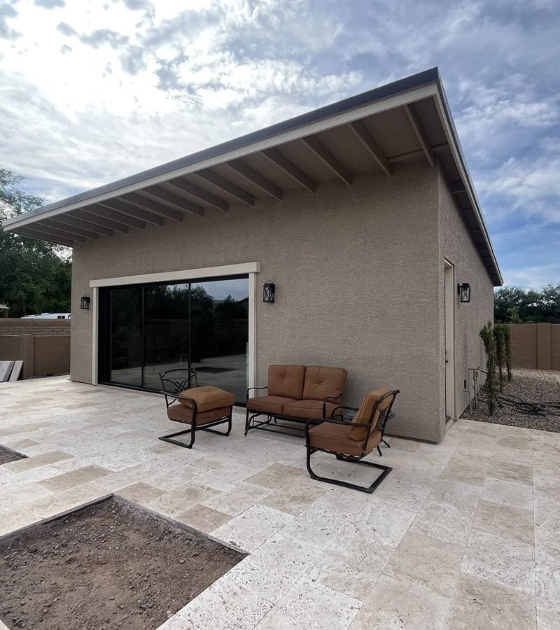 Queen Creek pool house with patio overhang and backyard entertaining space