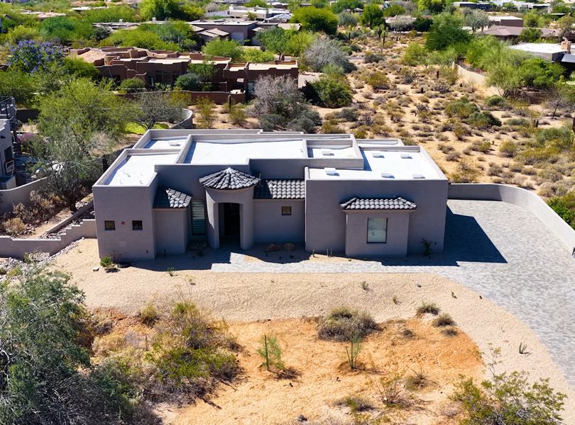 Wide aerial view of finished Scottsdale casita and paver driveway