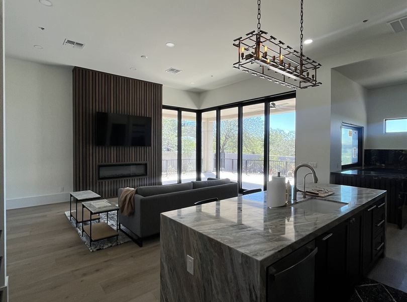 Casita living room and kitchen with large glass doors